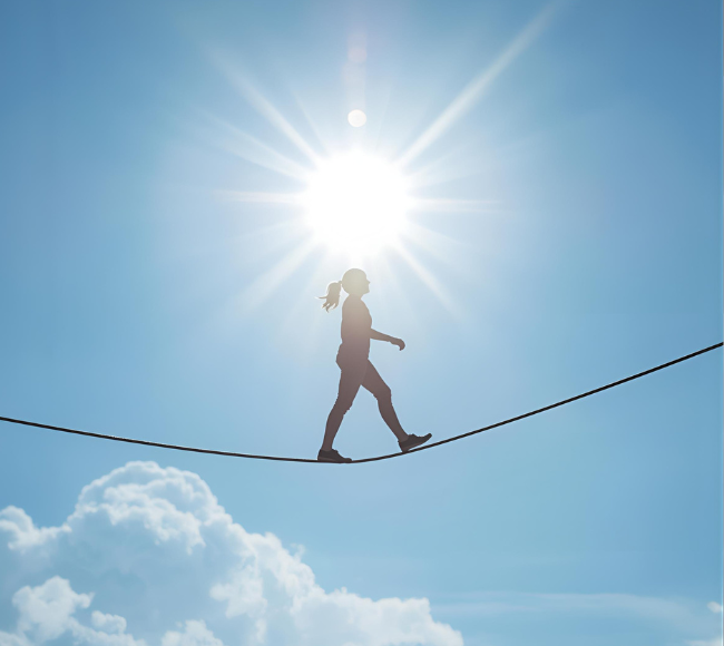 a woman showing self trust by walking on a tight rope